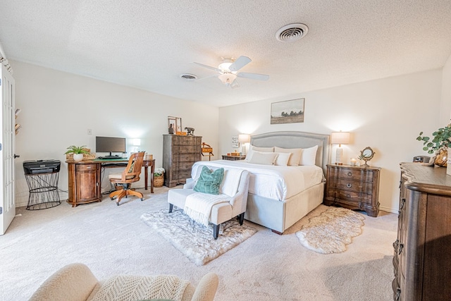 3615 W Wadley Ave, Midland, TX 79707 - bedroom featuring carpet flooring, a desk, a ceiling fan, and a textured ceiling