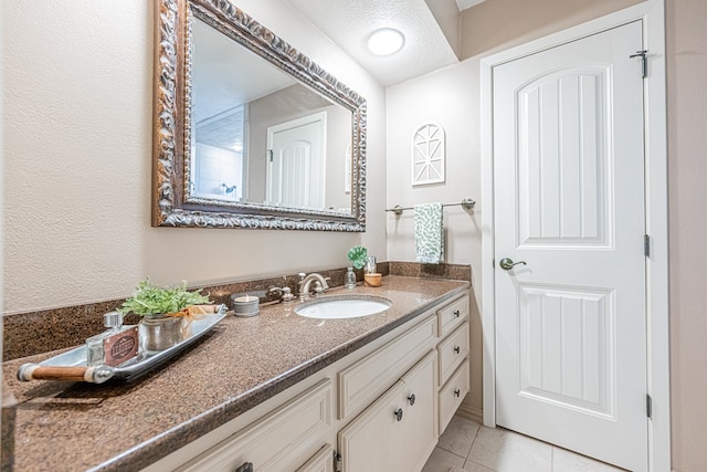 3615 W Wadley Ave, Midland, TX 79707 - bathroom featuring vanity and tile patterned flooring