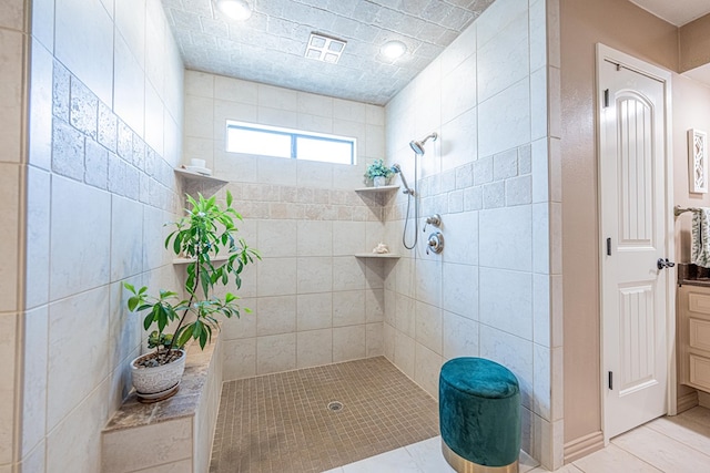 3615 W Wadley Ave, Midland, TX 79707 - bathroom with a walk in shower and tile patterned floors