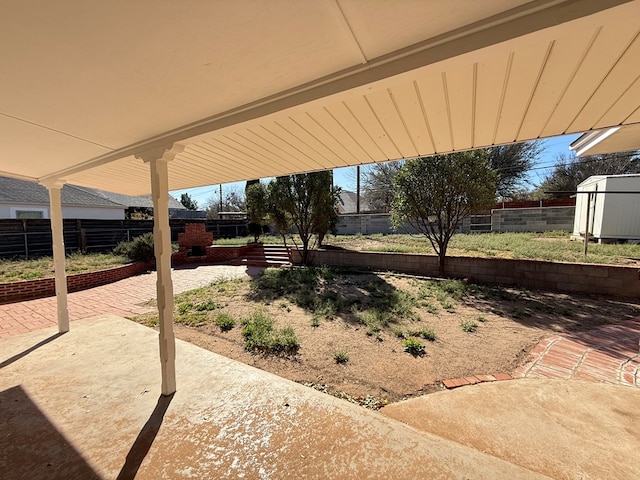 view of yard featuring a patio area and fence