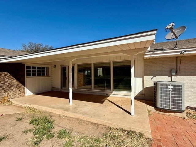 exterior space featuring central AC and a patio area