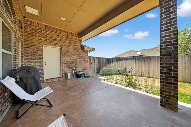 5712 Carmel Ct, Midland, TX 79707 - fenced backyard with grilling area and a patio area