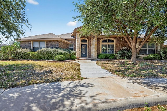 5712 Carmel Ct, Midland, TX 79707 - view of front of home featuring brick siding