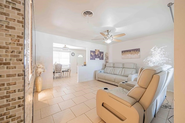 living room with ceiling fan