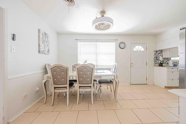 view of tiled dining space