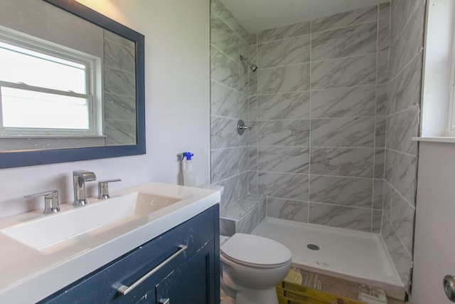 207 W Robinson Rd, Big Spring, TX 79720 - bathroom featuring vanity and a tile shower