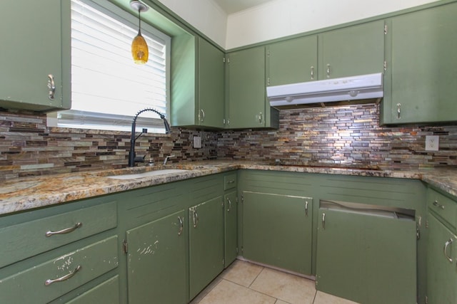 207 W Robinson Rd, Big Spring, TX 79720 - kitchen featuring under cabinet range hood, decorative backsplash, light tile patterned flooring, and electric stovetop