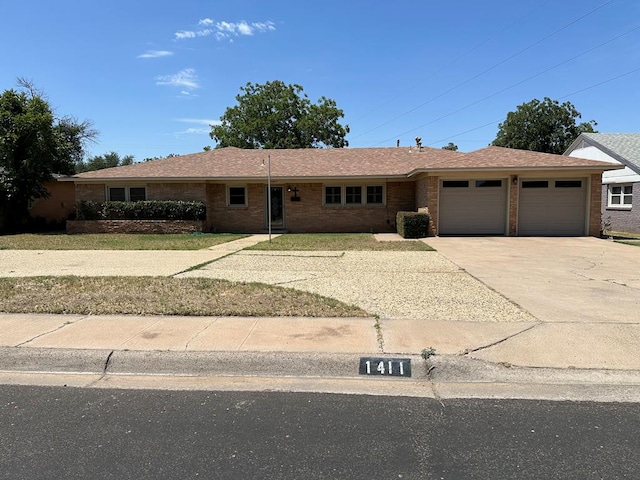 ranch-style home with a garage