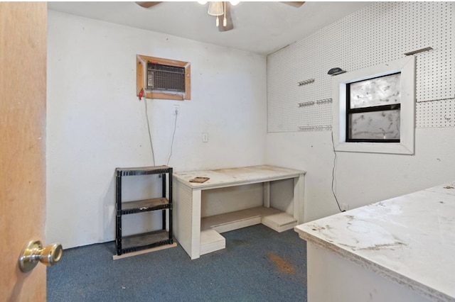 miscellaneous room featuring carpet, an AC wall unit, and ceiling fan