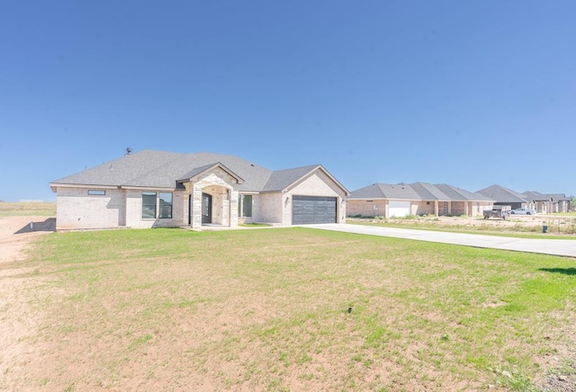 view of front of home featuring driveway, an attached garage, a residential view, and a front lawn