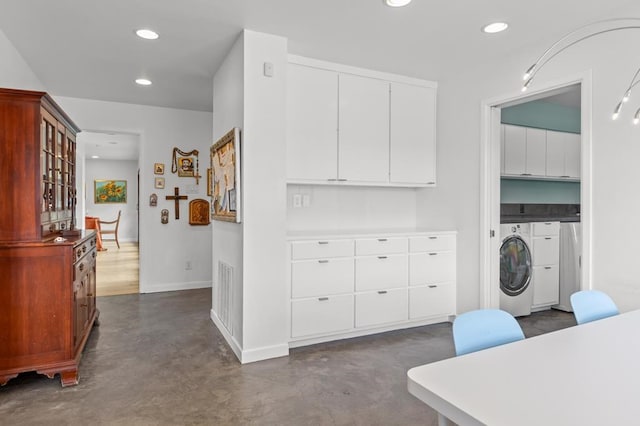 laundry area with recessed lighting, visible vents, baseboards, cabinet space, and washer / clothes dryer