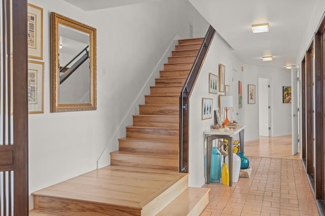 stairs with brick floor