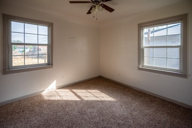 3114 Thomas Ave, Midland, TX 79701 - carpeted spare room with ceiling fan and baseboards