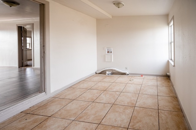3114 Thomas Ave, Midland, TX 79701 - laundry area featuring hookup for a washing machine and tile patterned floors