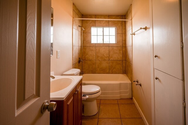 3114 Thomas Ave, Midland, TX 79701 - full bath featuring tile patterned flooring, vanity, and shower / bath combination
