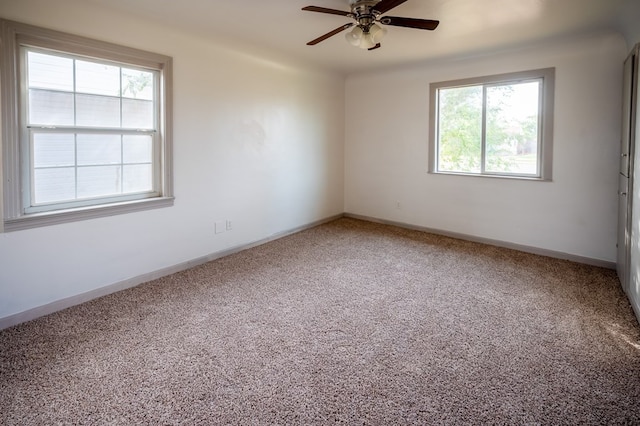 3114 Thomas Ave, Midland, TX 79701 - unfurnished room featuring healthy amount of natural light, carpet flooring, and ceiling fan