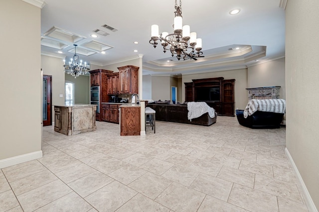 living area with ornamental molding, recessed lighting, and a notable chandelier
