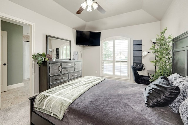 bedroom with light tile patterned floors and a ceiling fan