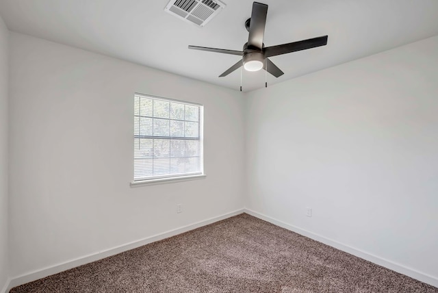 carpeted empty room with ceiling fan