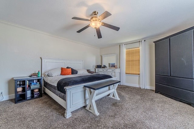 carpeted bedroom featuring a textured ceiling, ceiling fan, and crown molding