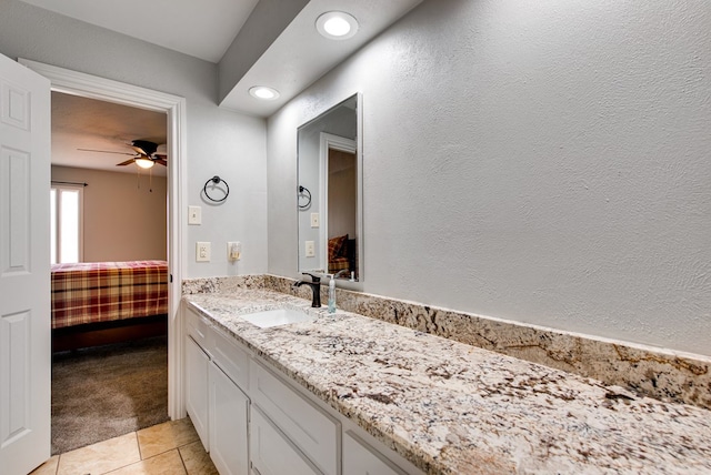 bathroom with vanity, recessed lighting, ceiling fan, and tile patterned floors