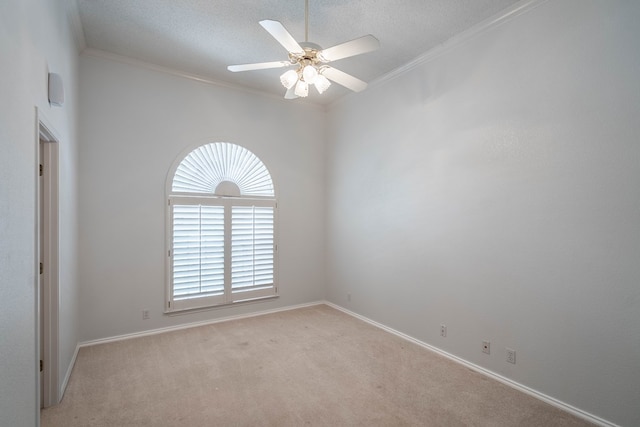5500 Drexel, Midland, TX 79707 - spare room with light carpet, a ceiling fan, crown molding, and a textured ceiling