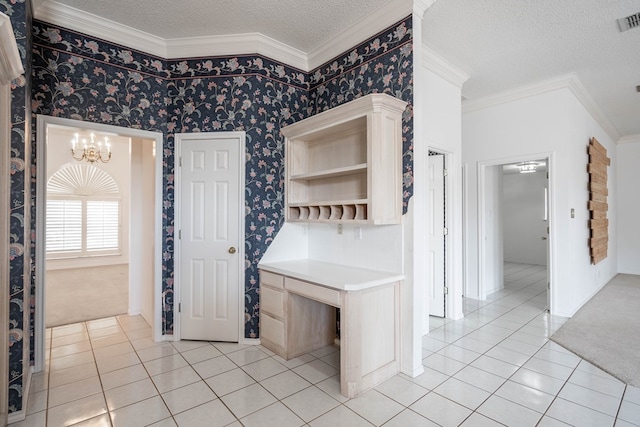 5500 Drexel, Midland, TX 79707 - interior space with a textured ceiling, light tile patterned floors, a chandelier, ornamental molding, and wallpapered walls