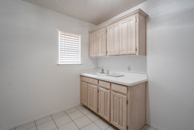 5500 Drexel, Midland, TX 79707 - laundry room with a sink and light tile patterned flooring