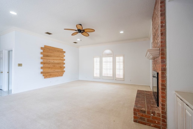 5500 Drexel, Midland, TX 79707 - unfurnished living room featuring a ceiling fan, a fireplace, crown molding, light colored carpet, and recessed lighting