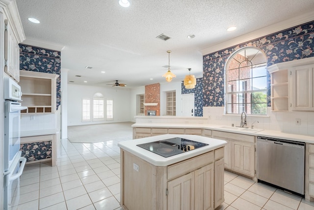 5500 Drexel, Midland, TX 79707 - kitchen with dishwasher, black electric stovetop, ceiling fan, light countertops, and light tile patterned floors