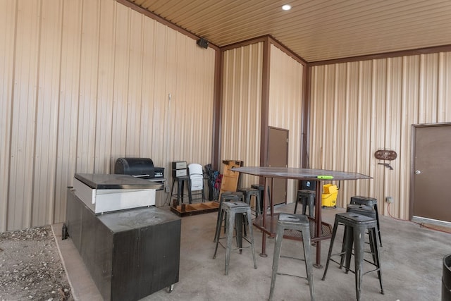 interior space with wood walls and wood ceiling