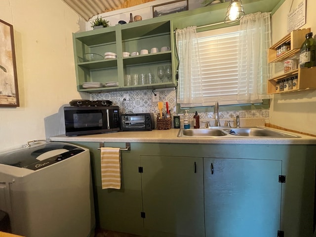 bar with a toaster, black microwave, decorative backsplash, and a sink