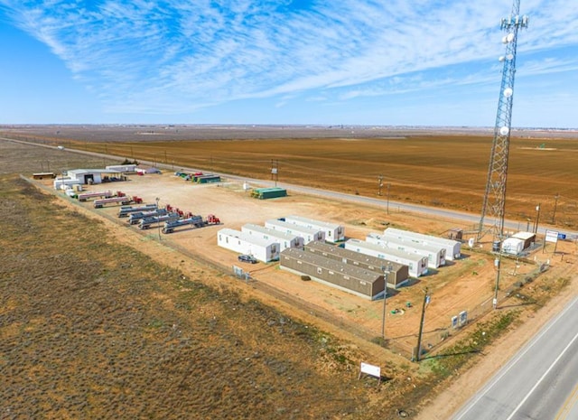 birds eye view of property with a rural view