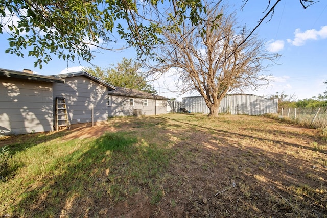 view of yard with fence