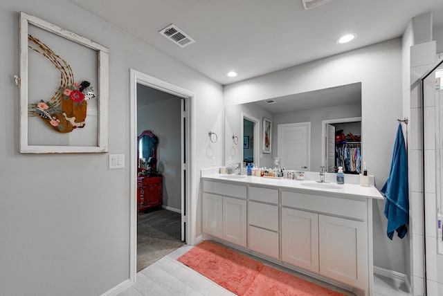 bathroom featuring hardwood / wood-style floors and vanity