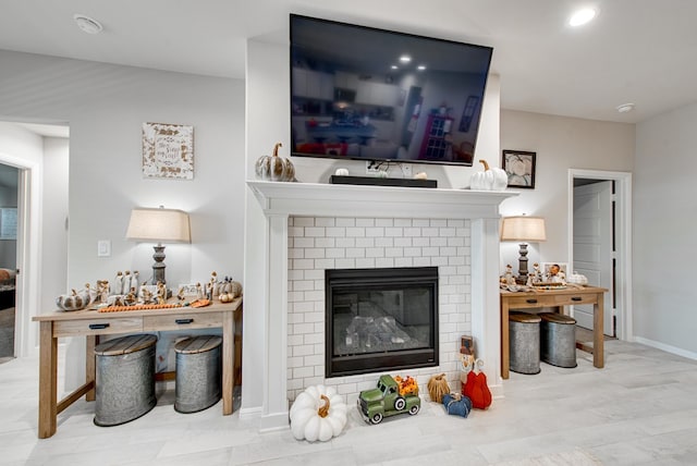 living room featuring a fireplace