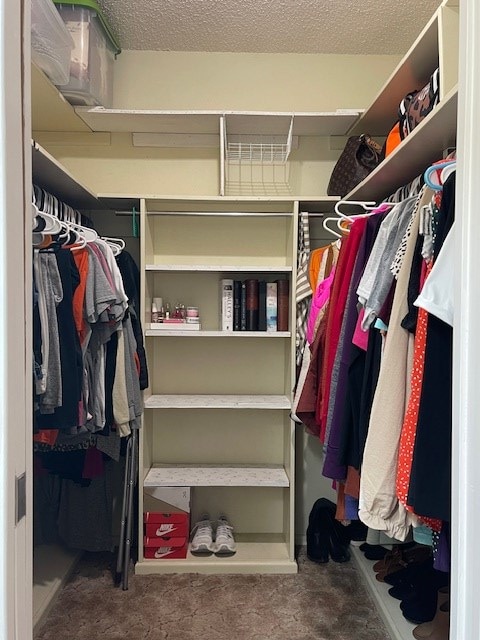 4500 El Paso, Snyder, TX 79549 - walk in closet featuring carpet flooring
