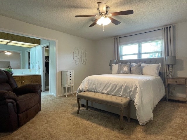 4500 El Paso, Snyder, TX 79549 - carpeted bedroom featuring a textured ceiling and ceiling fan