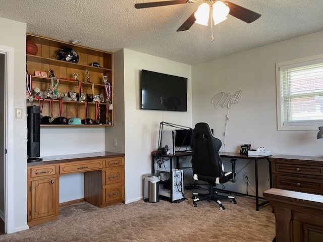 4500 El Paso, Snyder, TX 79549 - carpeted office space with ceiling fan and a textured ceiling