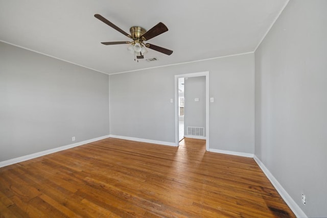 1309 Marijo, Big Spring, TX 79720 - unfurnished room with ceiling fan, wood finished floors, and ornamental molding