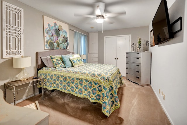 2309 W Golf Course Rd, Midland, TX 79701 - bedroom with a closet, ceiling fan, carpet, and baseboards