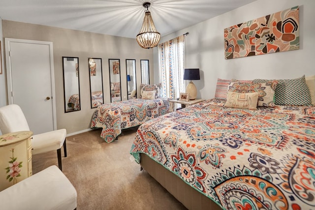 2309 W Golf Course Rd, Midland, TX 79701 - bedroom featuring a notable chandelier, carpet floors, and baseboards
