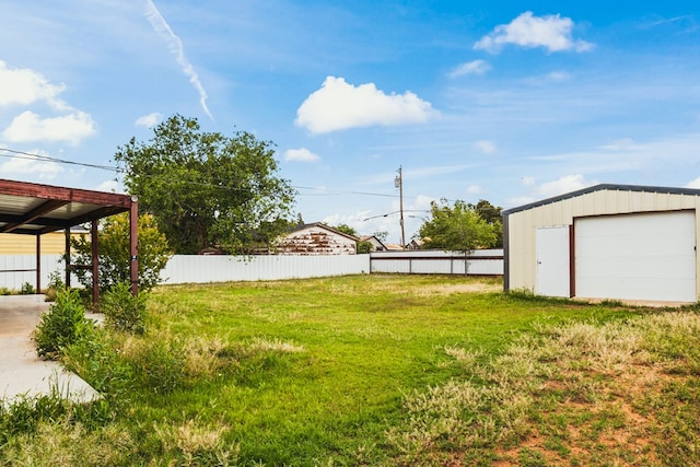 904 E Hester St, Brownfield, TX 79316 - view of yard with an outbuilding and a garage