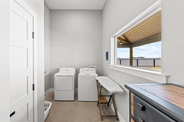 washroom with washer and clothes dryer