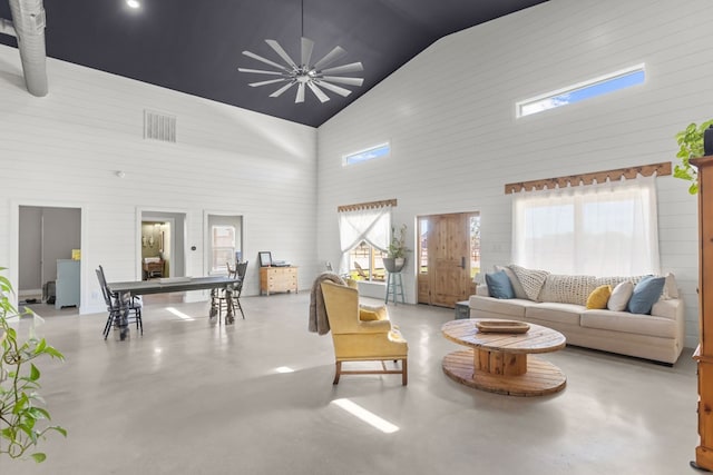 living room featuring high vaulted ceiling and ceiling fan