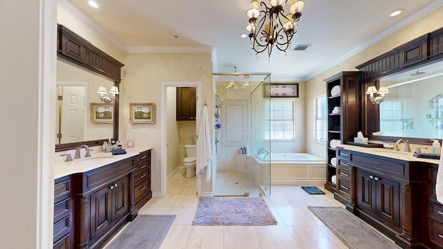 bathroom with a sink, a notable chandelier, and a shower stall