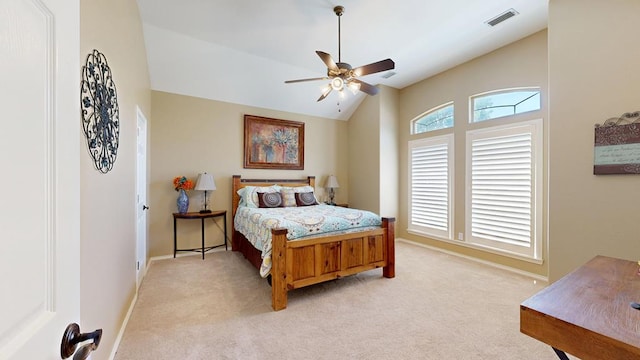 bedroom featuring visible vents, baseboards, light colored carpet, a ceiling fan, and vaulted ceiling