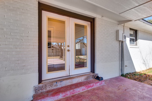 entrance to property featuring french doors