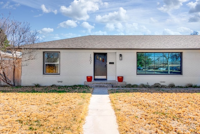 view of front facade with a front yard