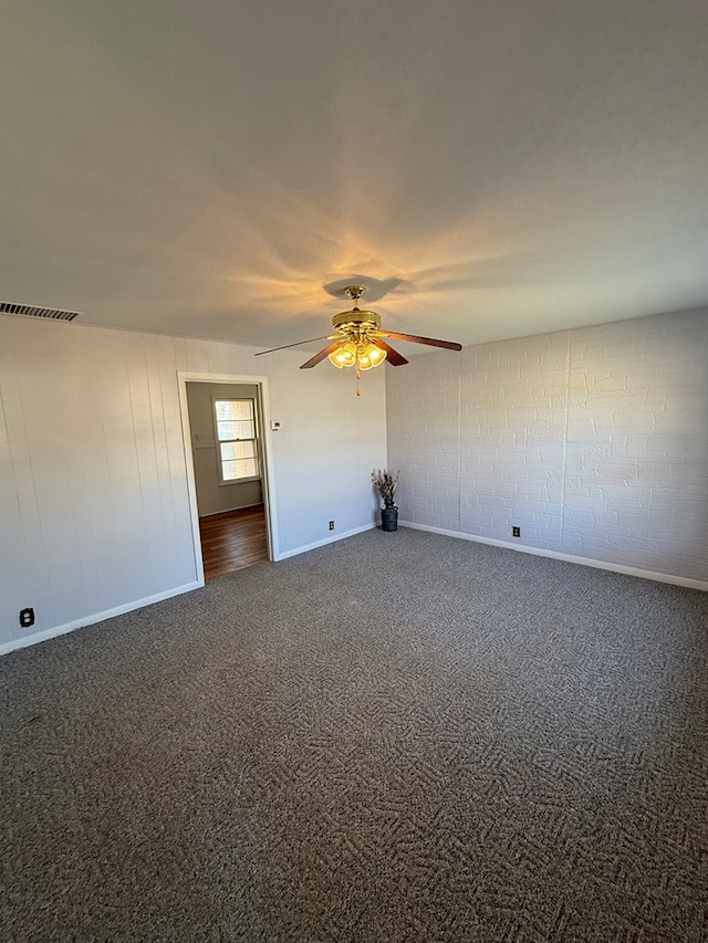 carpeted empty room with ceiling fan